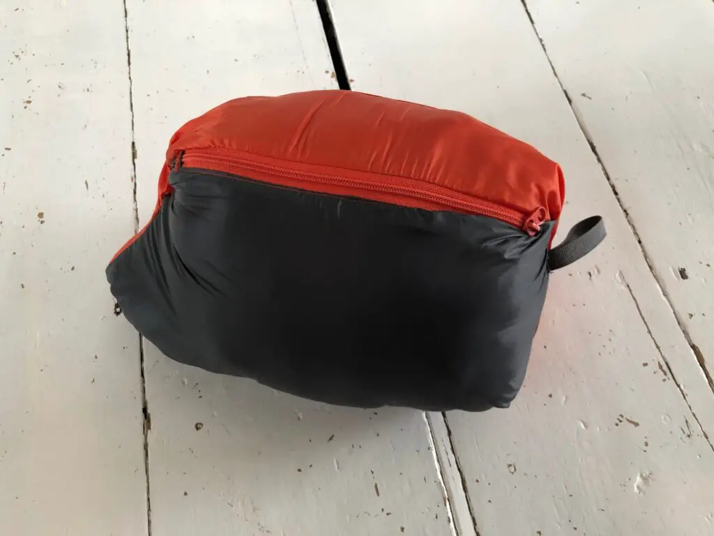 The Rab Cirrus Flex compressed into its own pocket