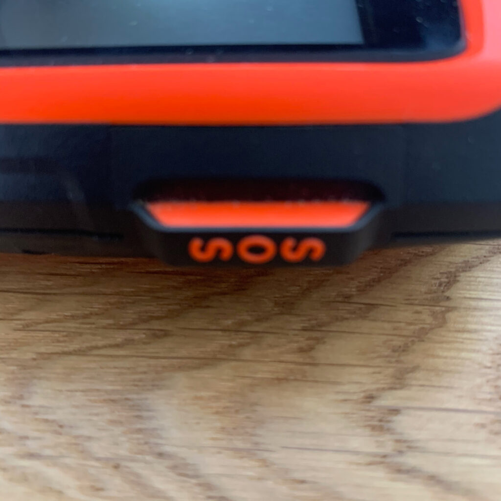 hatch covering the inreach sos button